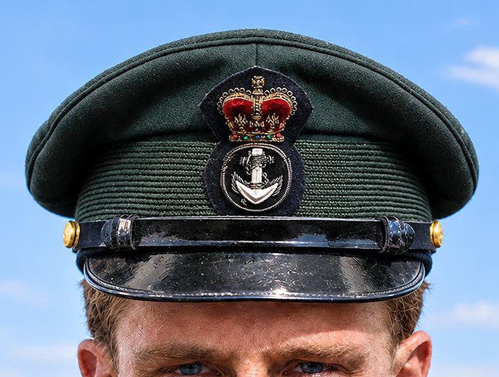 Photograph of Canadian Royal Navy Officer Visor Cap 1969, H.M.S. Rainbow