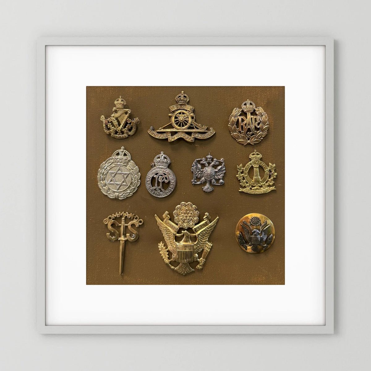 Composite image showing Display Boards of Military Insignia, Regimental & Service Cap Badges