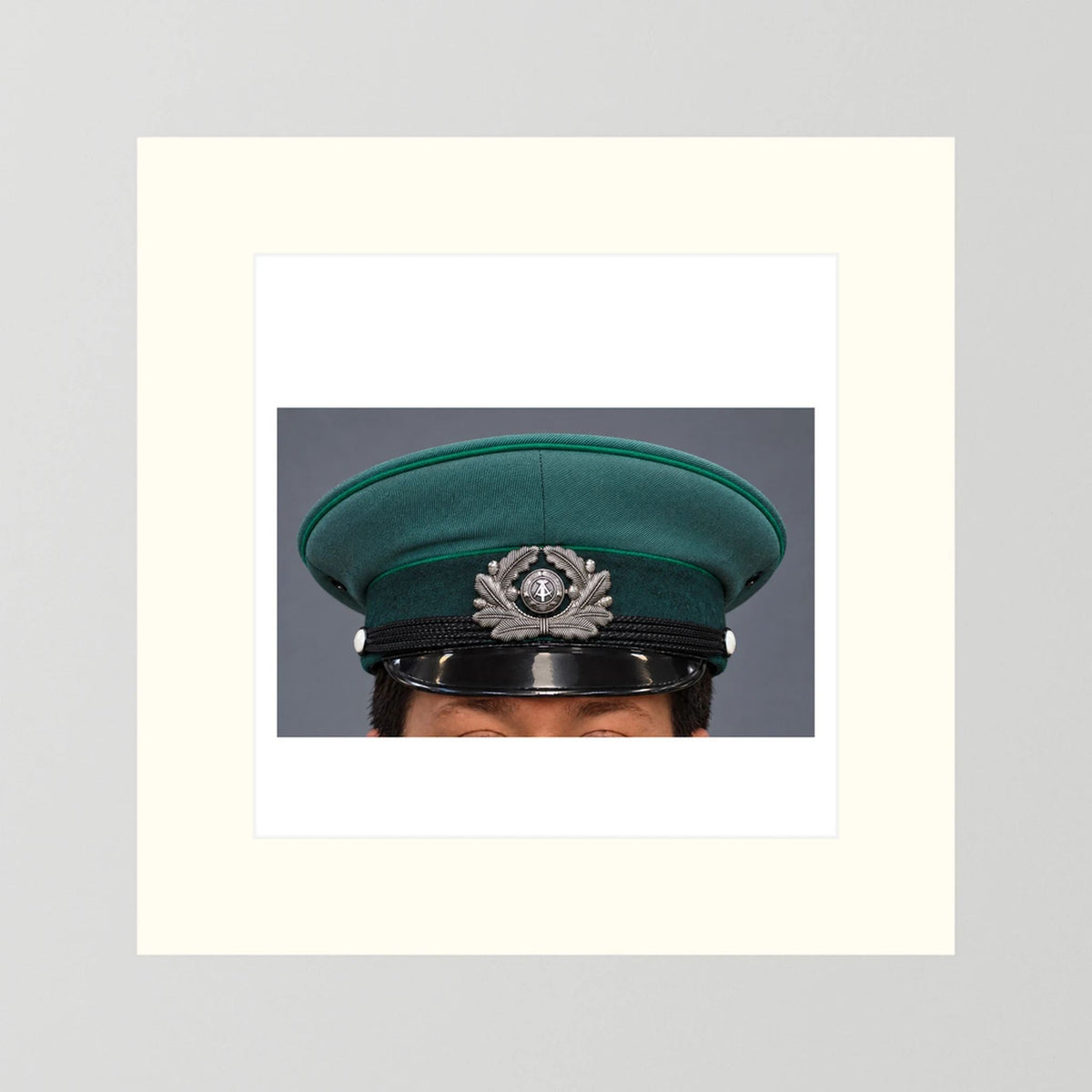 East German Volkpolizei (People's Police), Visor Cap, January 1989 — photograph presentation mockup