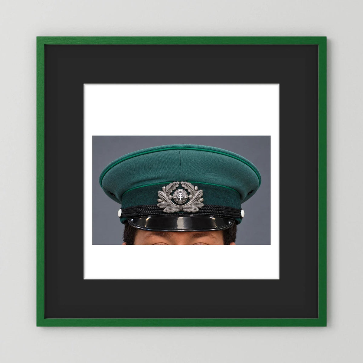 East German Volkpolizei (People's Police), Visor Cap, January 1989 — photograph presentation mockup