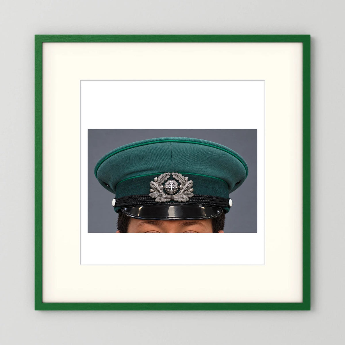 East German Volkpolizei (People's Police), Visor Cap, January 1989 — photograph presentation mockup