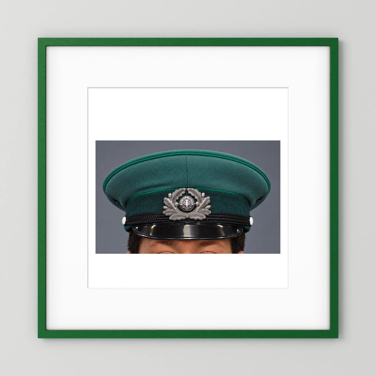 East German Volkpolizei (People's Police), Visor Cap, January 1989 — photograph presentation mockup