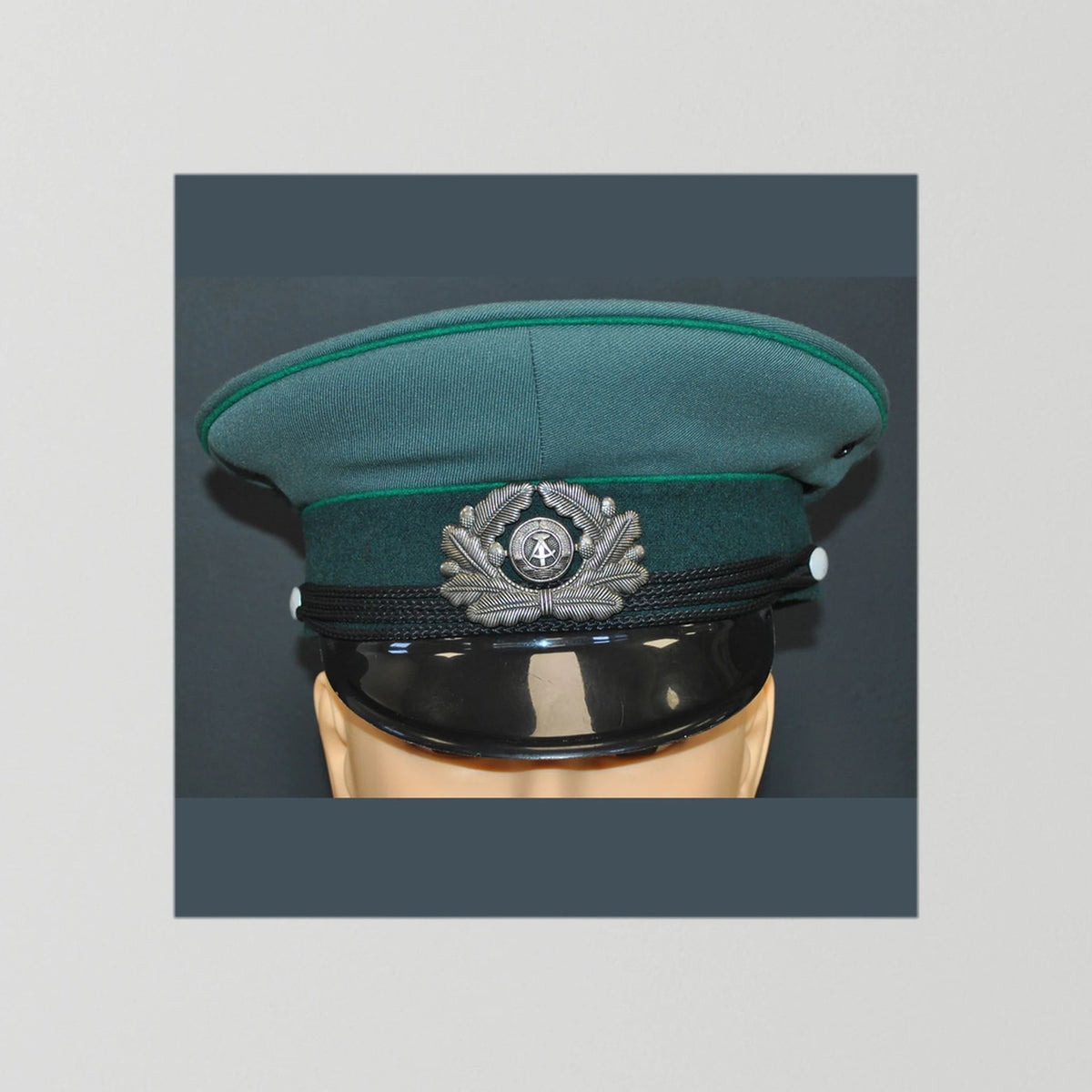 East Germany, Border Guard Cap, January 1989. Photograph - Art goes to War