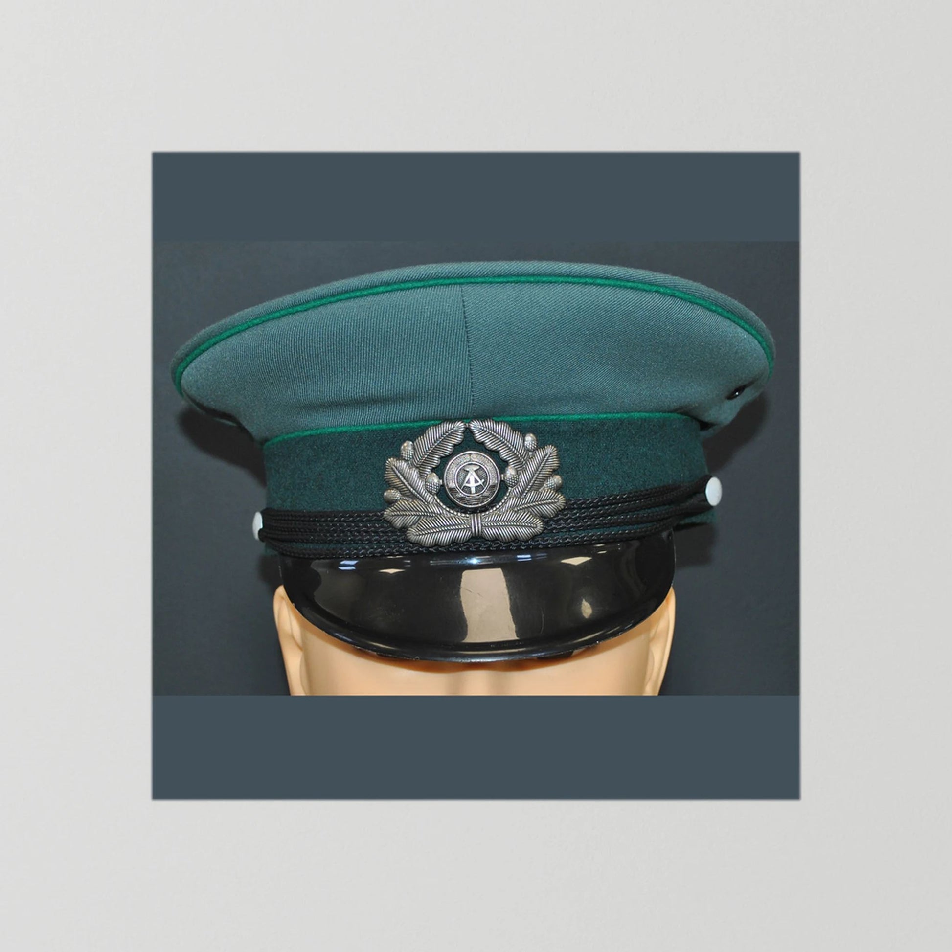 East Germany, Border Guard Cap, January 1989. Photograph - Art goes to War