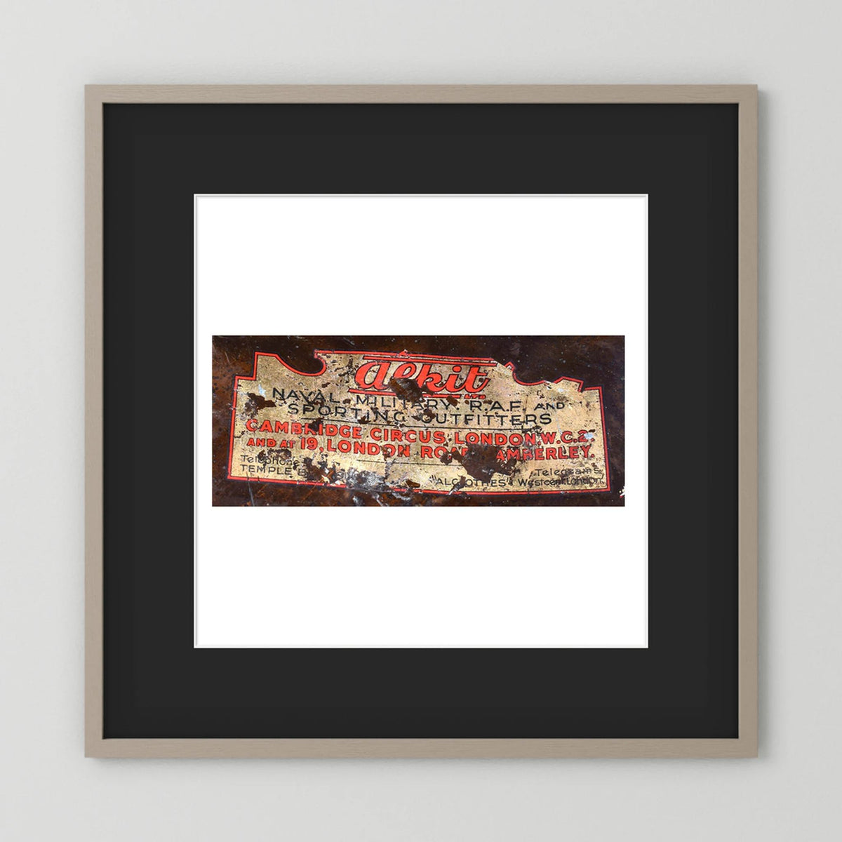 Labels: Alkit, Cambridge Circus — photograph displayed in a dark oak frame mockup