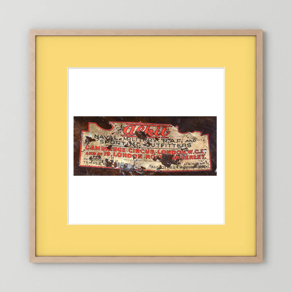 Labels: Alkit, Cambridge Circus — photograph displayed in a dark oak frame mockup