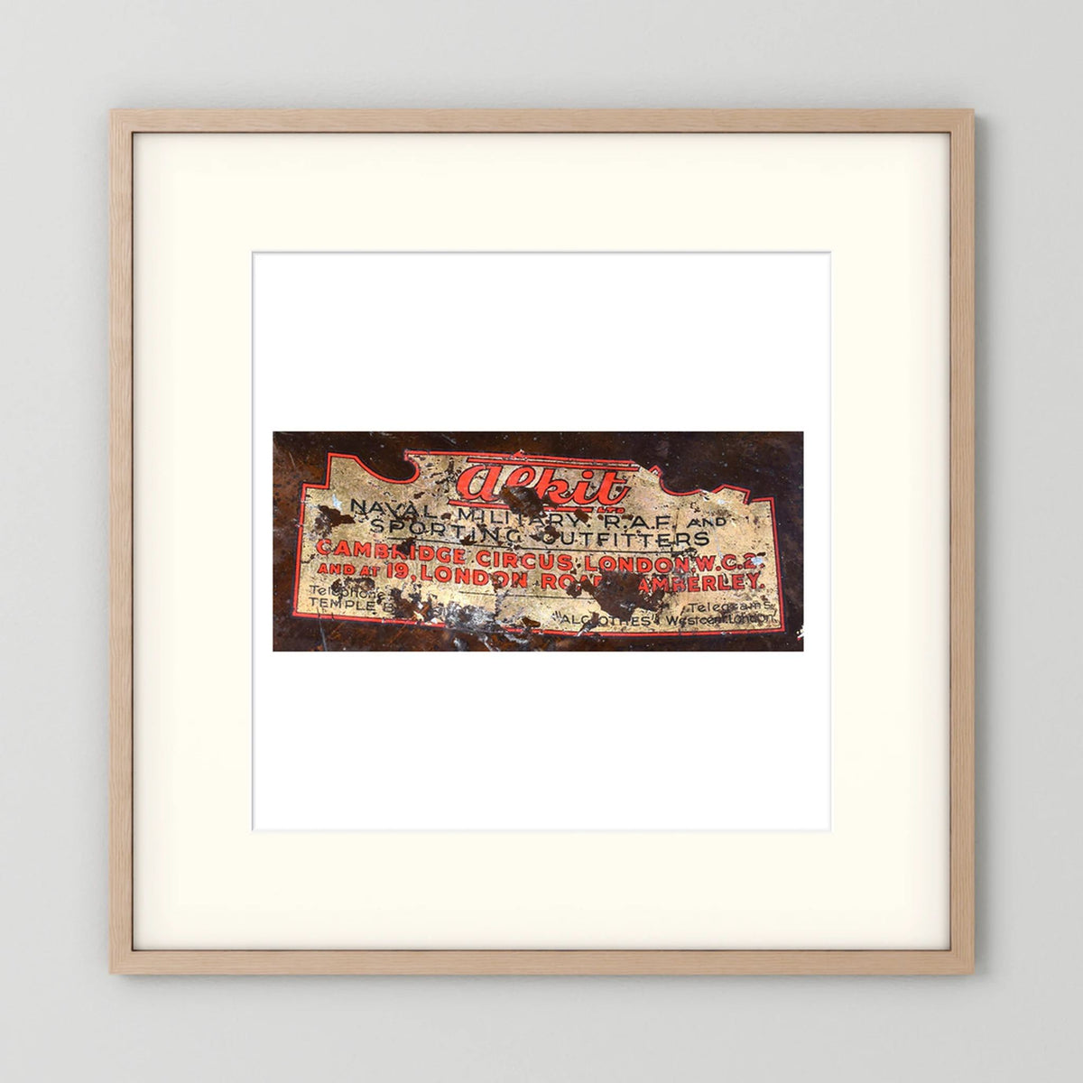 Labels: Alkit, Cambridge Circus — photograph displayed in a dark oak frame mockup