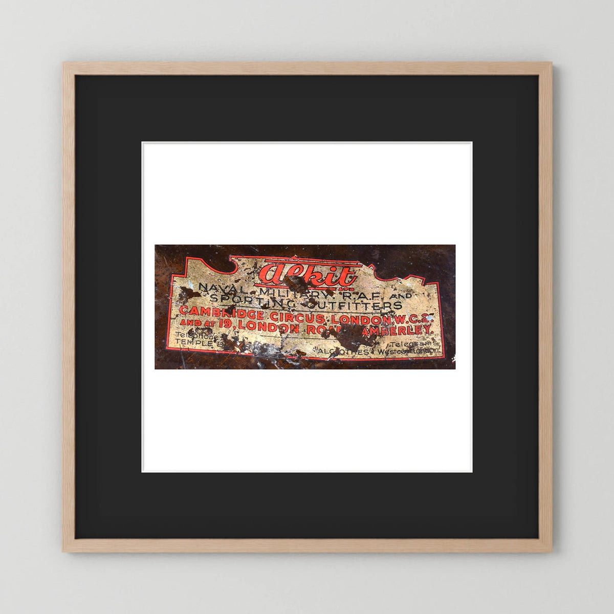 Labels: Alkit, Cambridge Circus — photograph displayed in a dark oak frame mockup