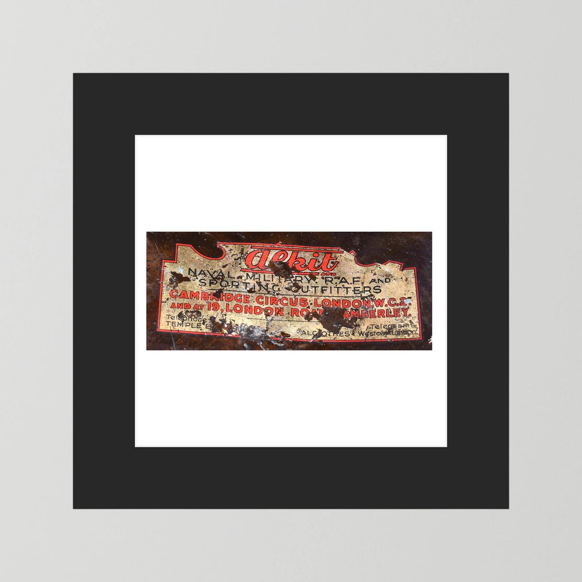 Labels: Alkit, Cambridge Circus — photograph displayed in a dark oak frame mockup