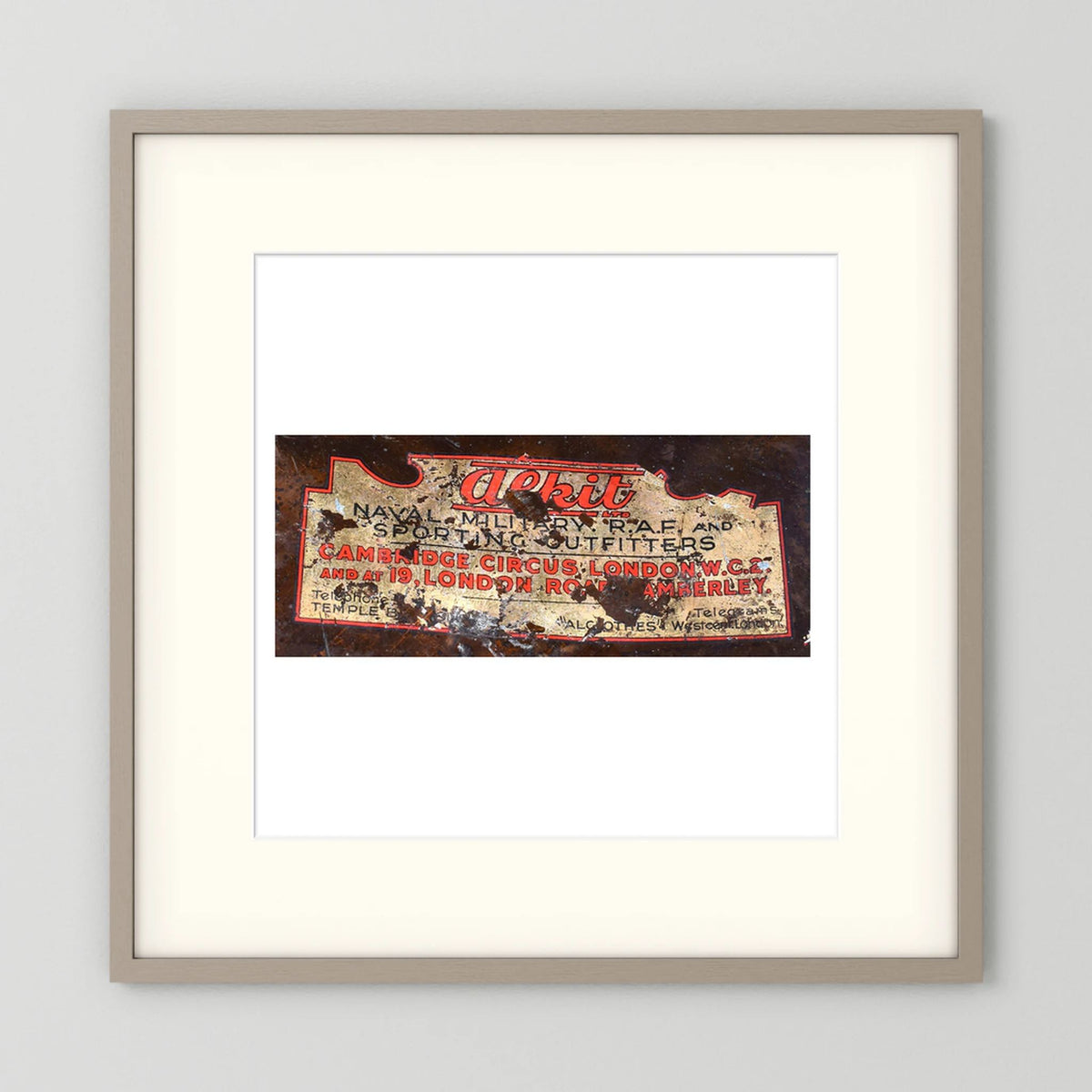 Labels: Alkit, Cambridge Circus — photograph displayed in a dark oak frame mockup