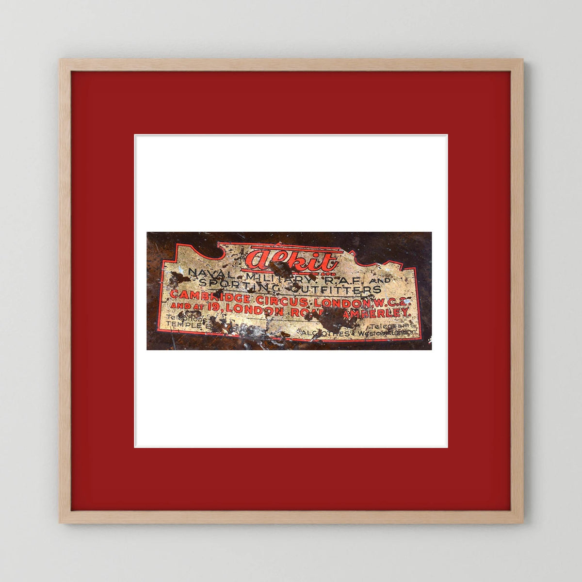 Labels: Alkit, Cambridge Circus — photograph displayed in a dark oak frame mockup
