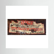 Labels: Alkit, Cambridge Circus — photograph displayed in a dark oak frame mockup