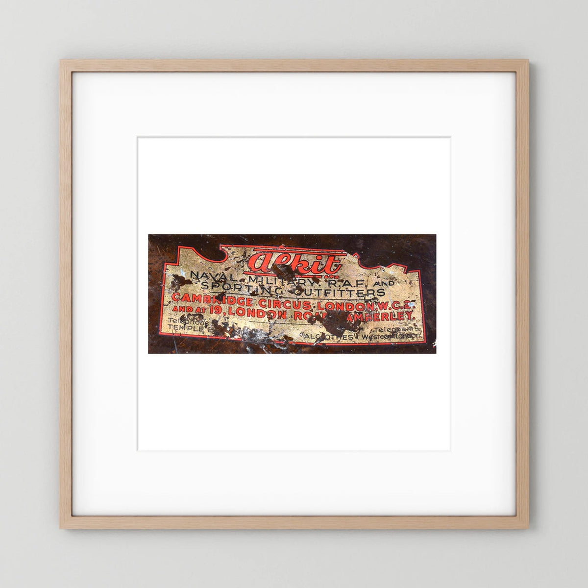 Labels: Alkit, Cambridge Circus — photograph displayed in a dark oak frame mockup