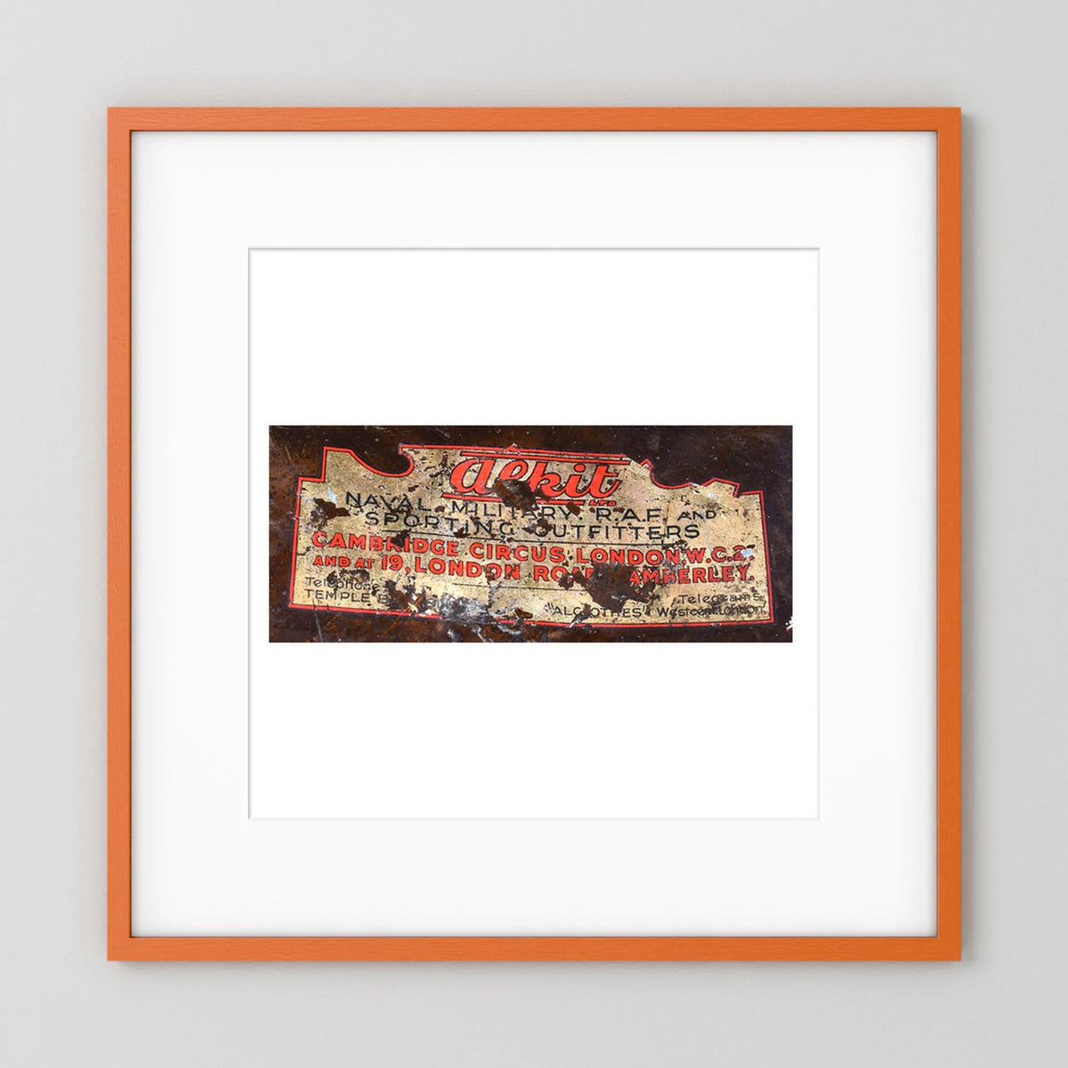 Labels: Alkit, Cambridge Circus — photograph displayed in a dark oak frame mockup