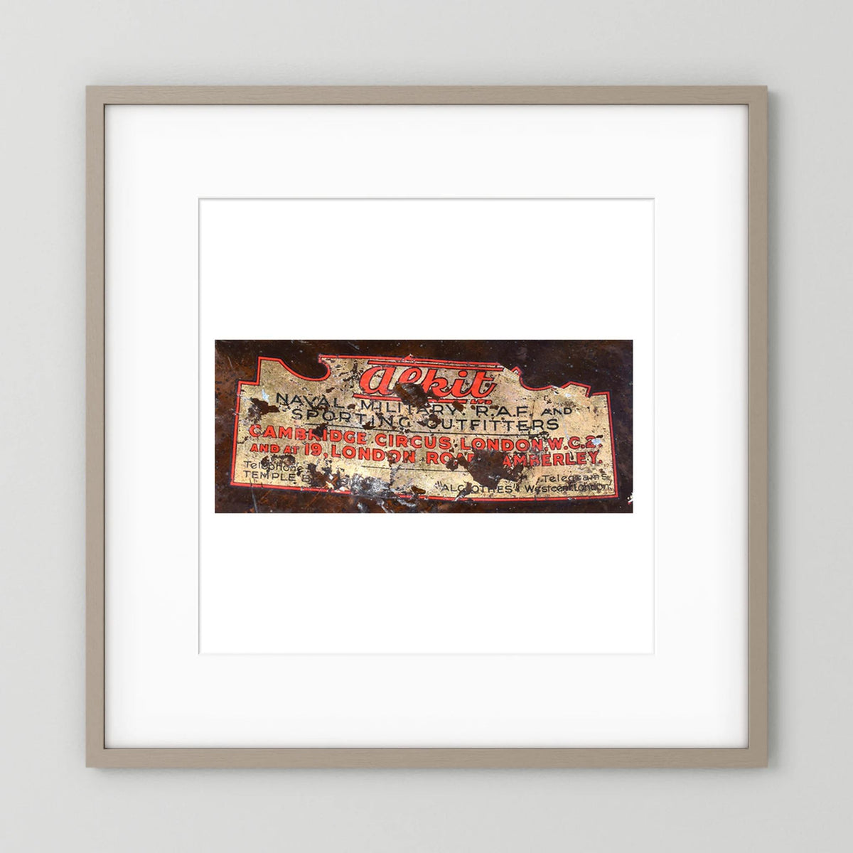 Labels: Alkit, Cambridge Circus — photograph displayed in a dark oak frame mockup
