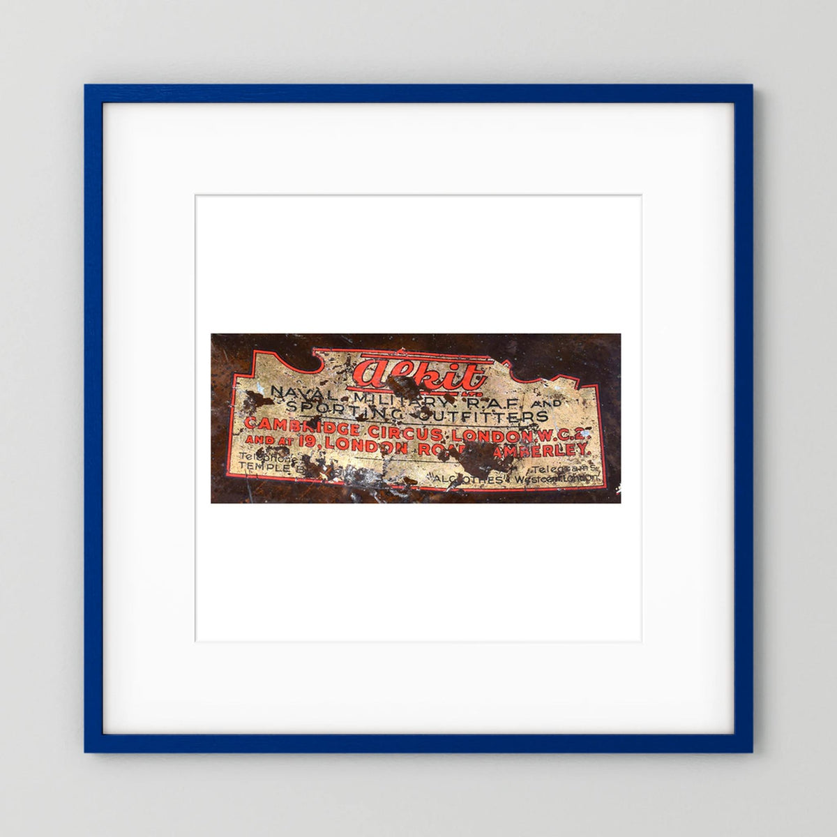 Labels: Alkit, Cambridge Circus — photograph displayed in a dark oak frame mockup