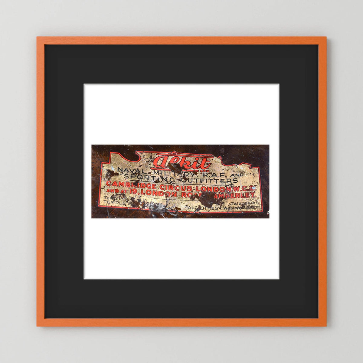 Labels: Alkit, Cambridge Circus — photograph displayed in a dark oak frame mockup