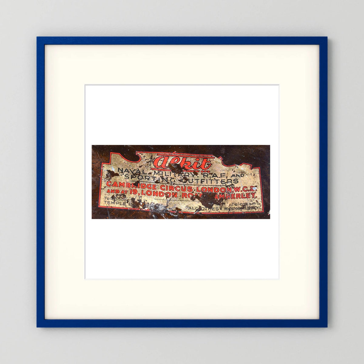 Labels: Alkit, Cambridge Circus — photograph displayed in a dark oak frame mockup