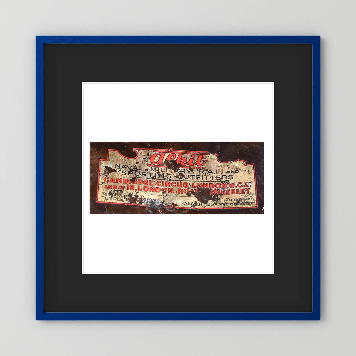 Labels: Alkit, Cambridge Circus — photograph displayed in a dark oak frame mockup
