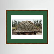 Mk II Brodie Helmet WW2 British Armed Forces. All ranks — photograph displayed in a black wood frame mockup