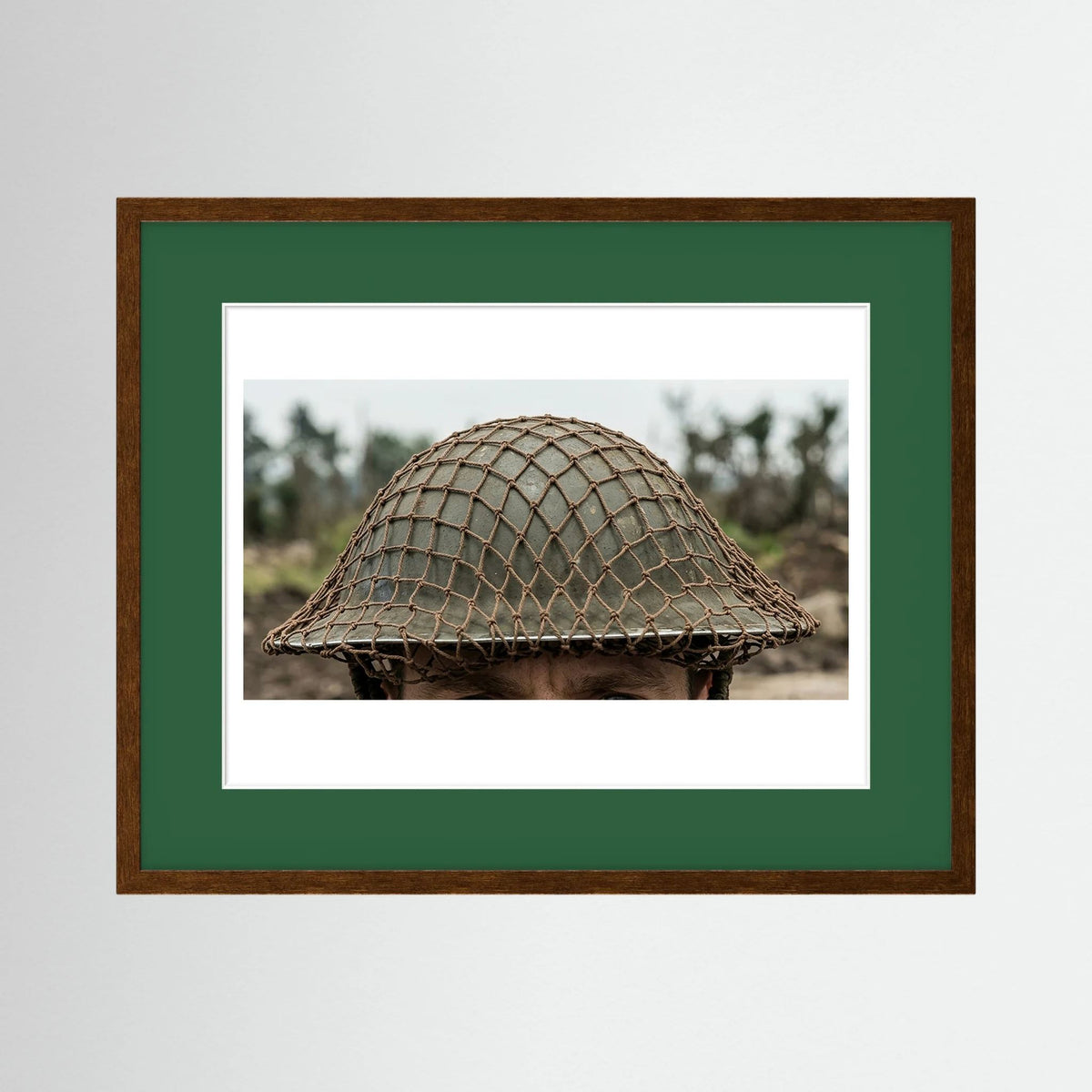 Mk II Brodie Helmet WW2 British Armed Forces. All ranks — photograph displayed in a black wood frame mockup