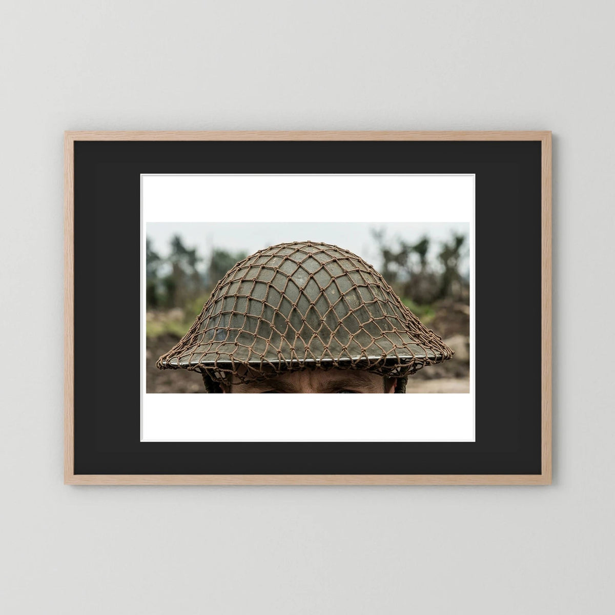 Mk II Brodie Helmet WW2 British Armed Forces. All ranks — photograph displayed in a black wood frame mockup