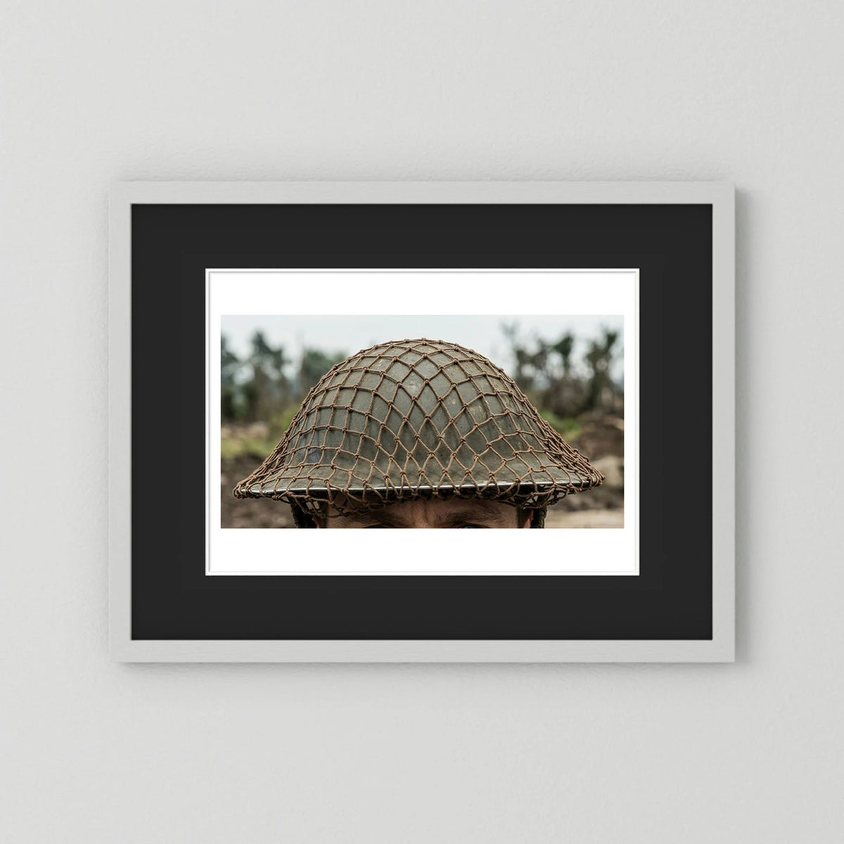 Mk II Brodie Helmet WW2 British Armed Forces. All ranks — photograph displayed in a black wood frame mockup