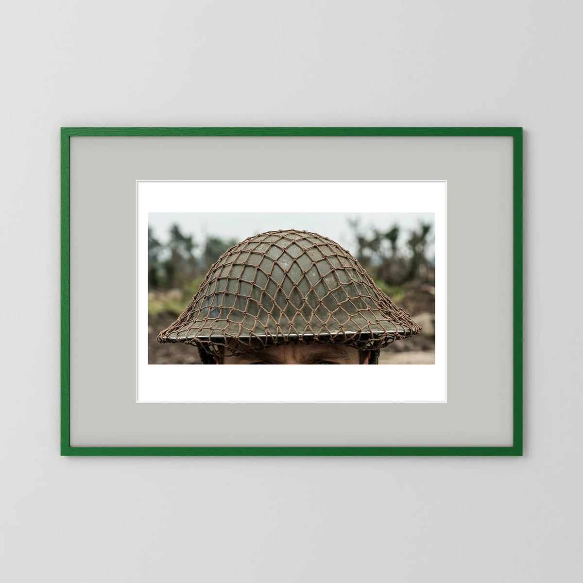 Mk II Brodie Helmet WW2 British Armed Forces. All ranks — photograph displayed in a black wood frame mockup