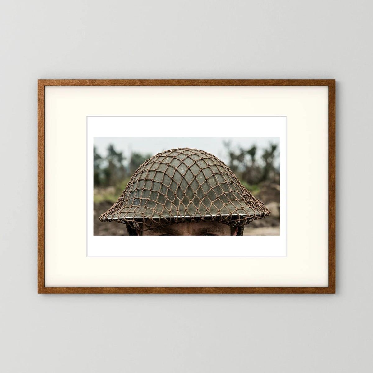 Mk II Brodie Helmet WW2 British Armed Forces. All ranks — photograph displayed in a black wood frame mockup