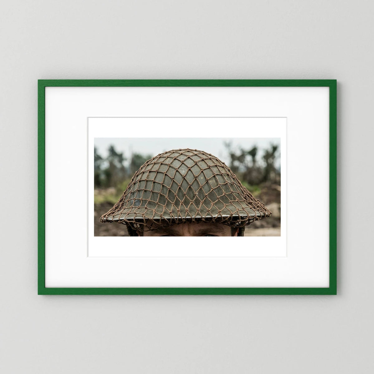 Mk II Brodie Helmet WW2 British Armed Forces. All ranks — photograph displayed in a black wood frame mockup