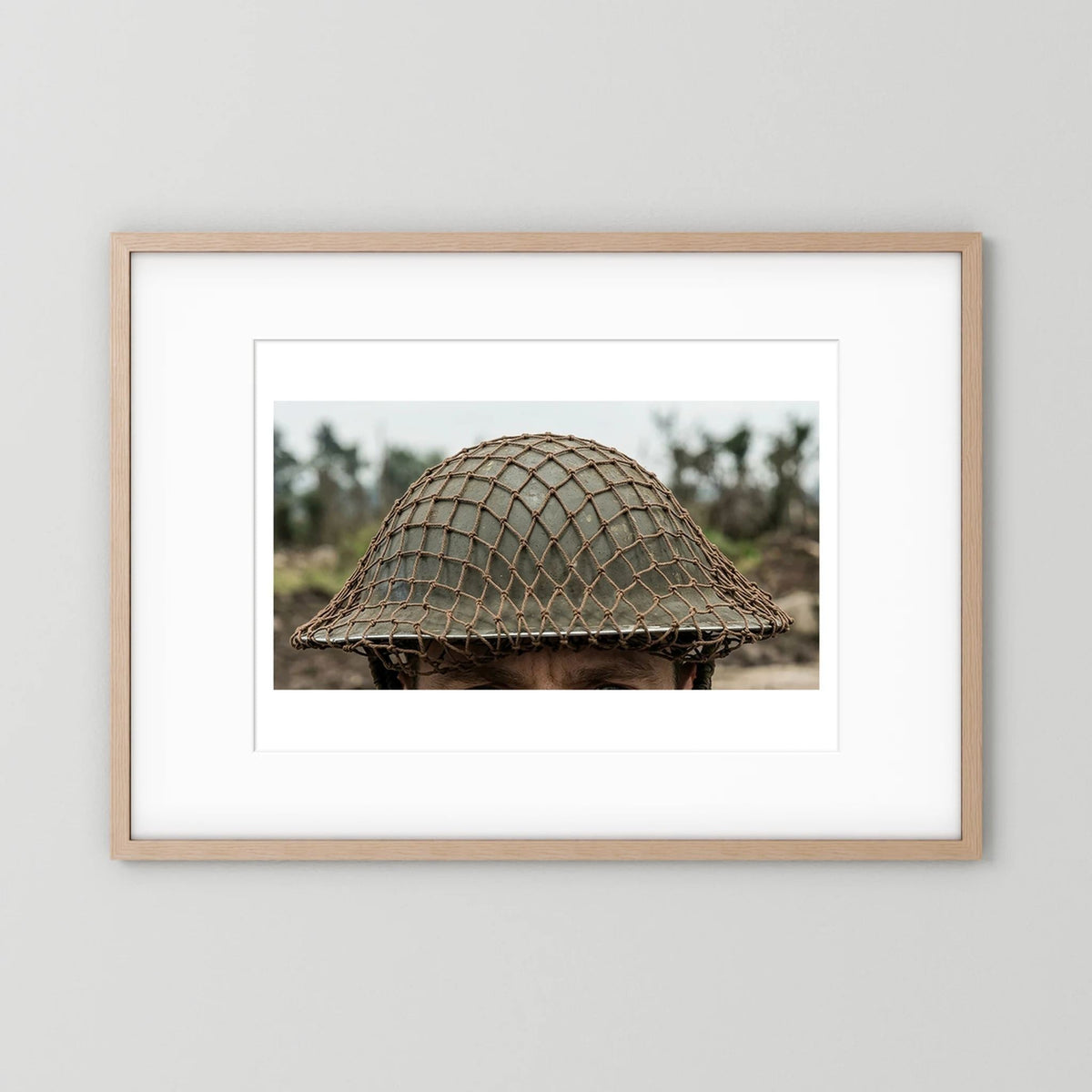 Mk II Brodie Helmet WW2 British Armed Forces. All ranks — photograph displayed in a black wood frame mockup