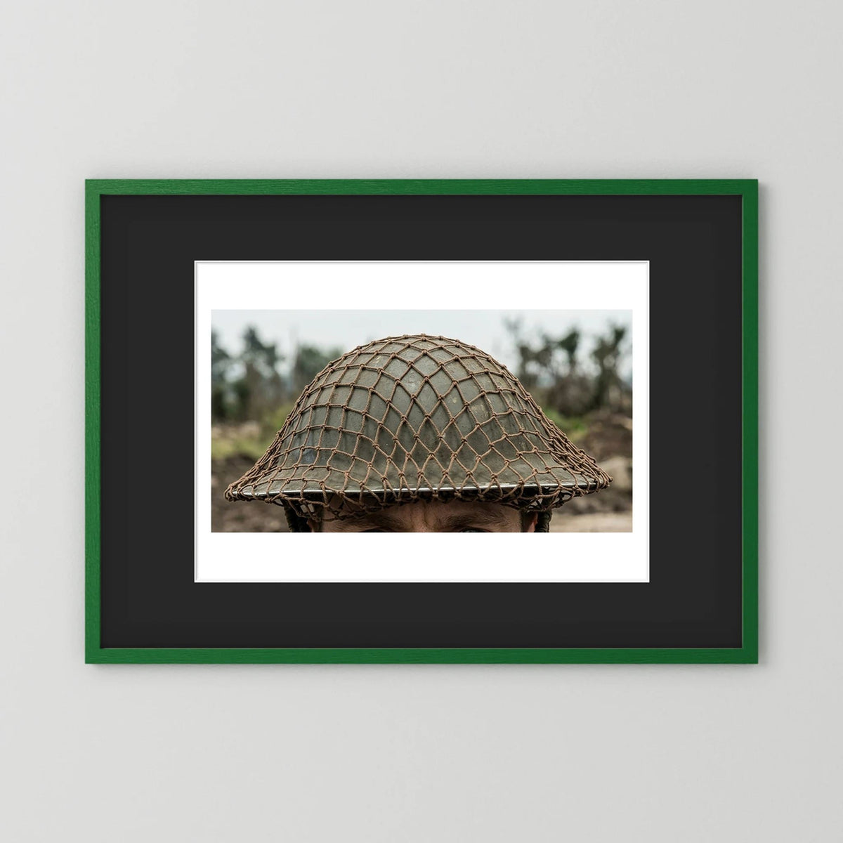 Mk II Brodie Helmet WW2 British Armed Forces. All ranks — photograph displayed in a black wood frame mockup