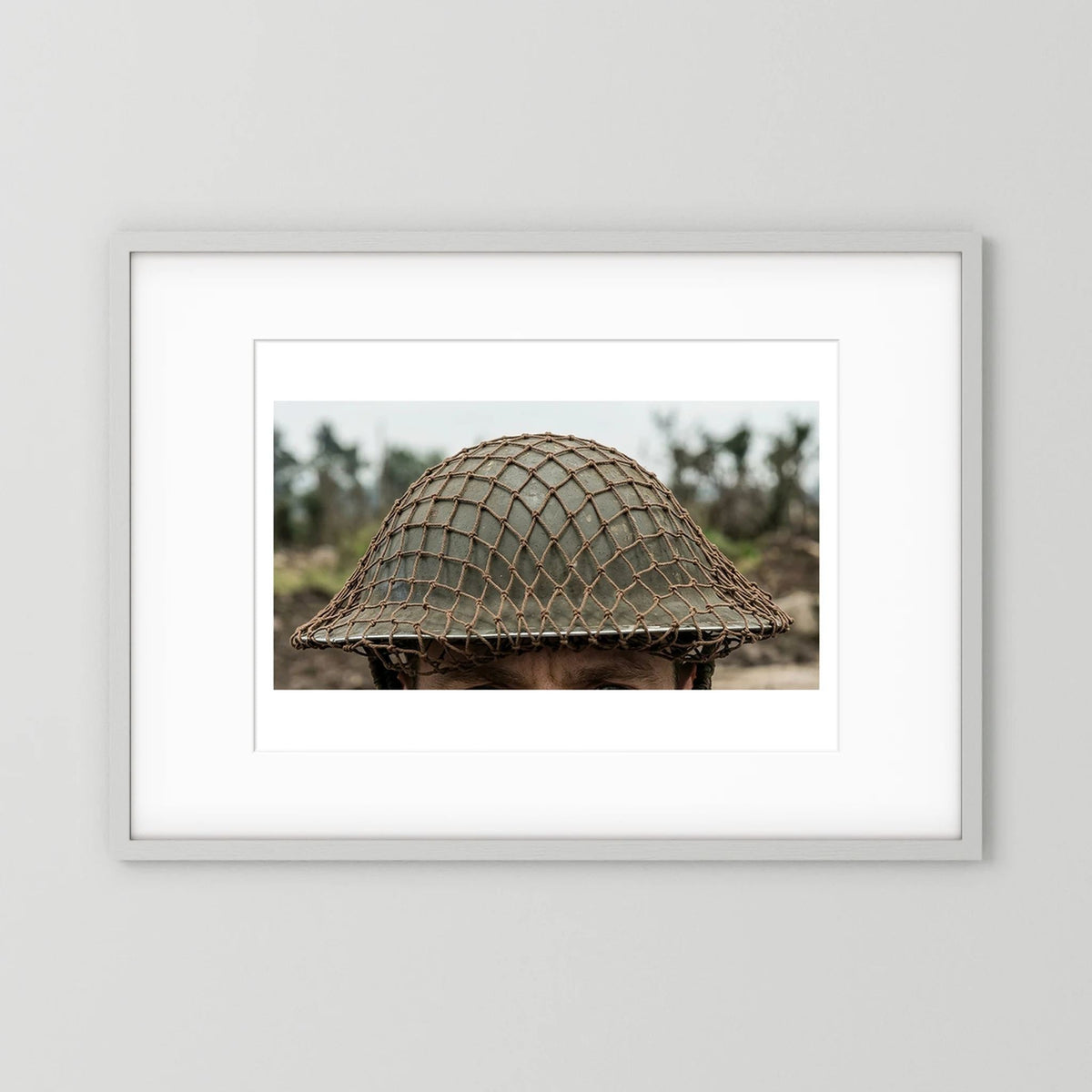 Mk II Brodie Helmet WW2 British Armed Forces. All ranks — photograph displayed in a black wood frame mockup