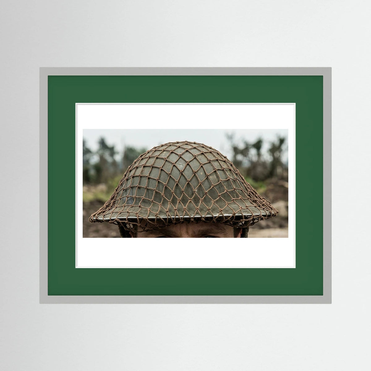 Mk II Brodie Helmet WW2 British Armed Forces. All ranks — photograph displayed in a black wood frame mockup