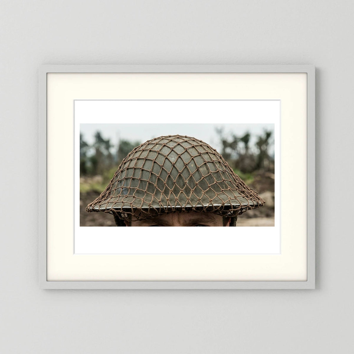 Mk II Brodie Helmet WW2 British Armed Forces. All ranks — photograph displayed in a black wood frame mockup