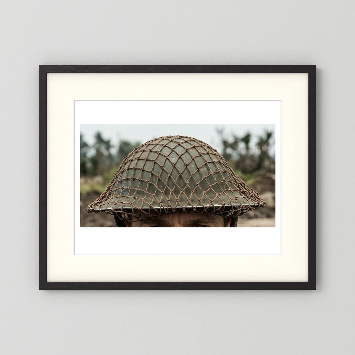 Mk II Brodie Helmet WW2 British Armed Forces. All ranks — photograph displayed in a black wood frame mockup