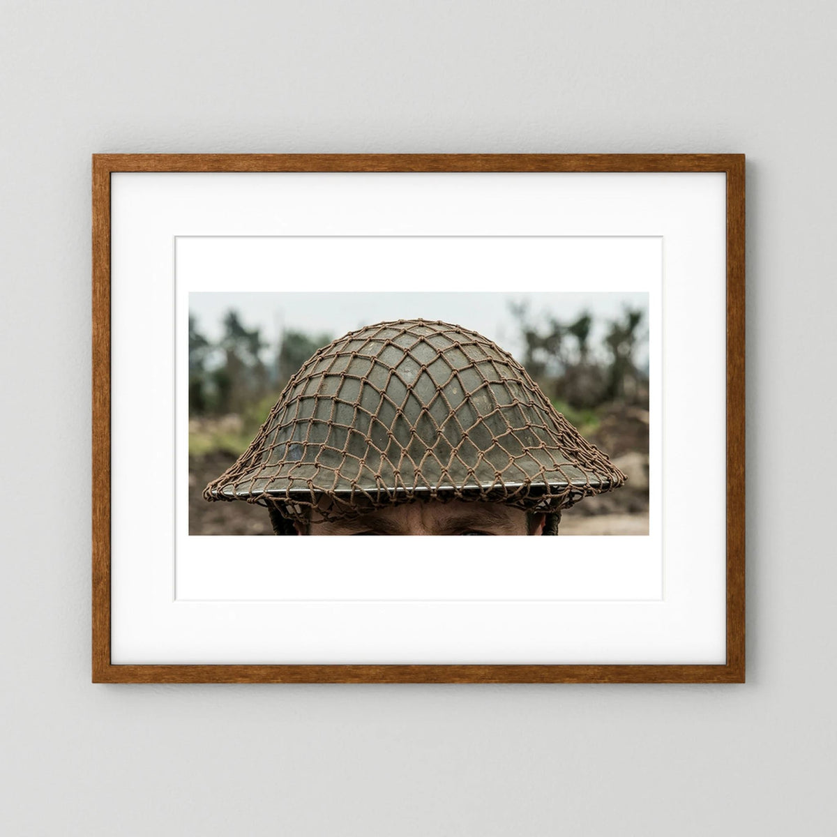 Mk II Brodie Helmet WW2 British Armed Forces. All ranks — photograph displayed in a black wood frame mockup