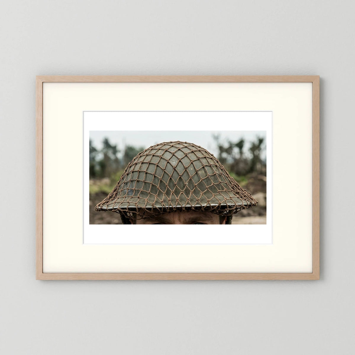 Mk II Brodie Helmet WW2 British Armed Forces. All ranks — photograph displayed in a black wood frame mockup