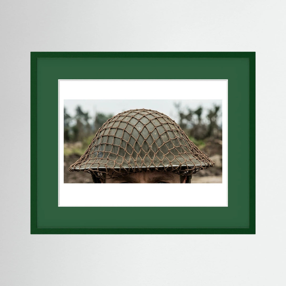 Mk II Brodie Helmet WW2 British Armed Forces. All ranks — photograph displayed in a black wood frame mockup