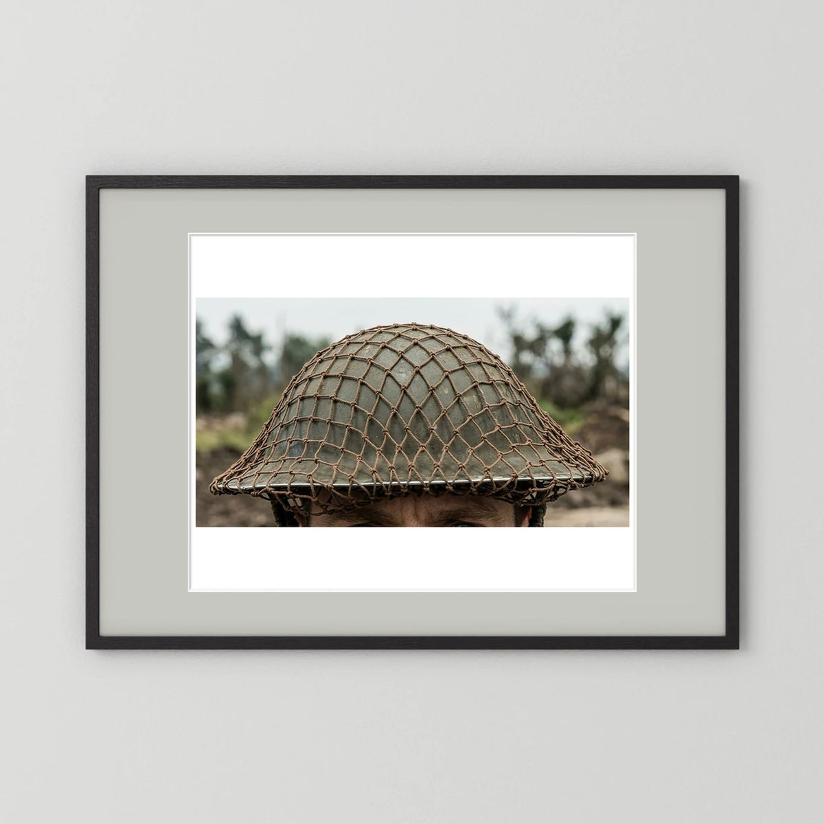 Mk II Brodie Helmet WW2 British Armed Forces. All ranks — photograph displayed in a black wood frame mockup