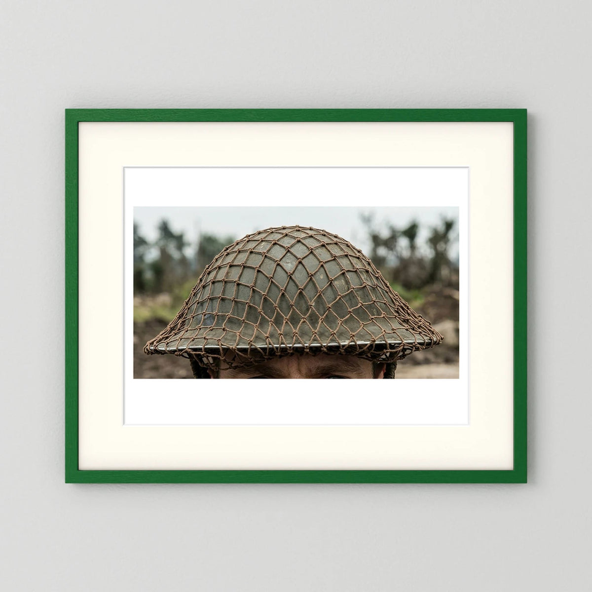 Mk II Brodie Helmet WW2 British Armed Forces. All ranks — photograph displayed in a black wood frame mockup