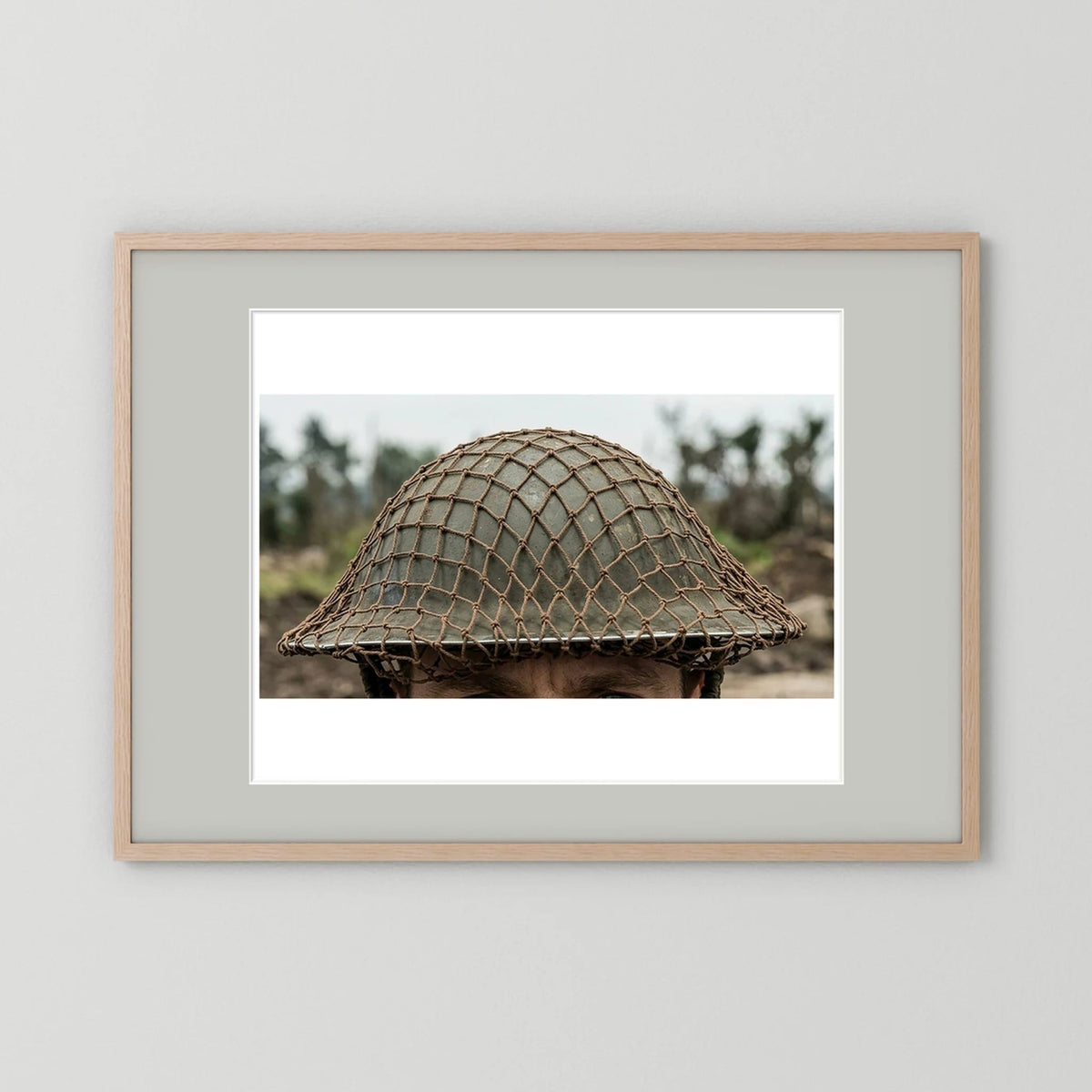 Mk II Brodie Helmet WW2 British Armed Forces. All ranks — photograph displayed in a black wood frame mockup