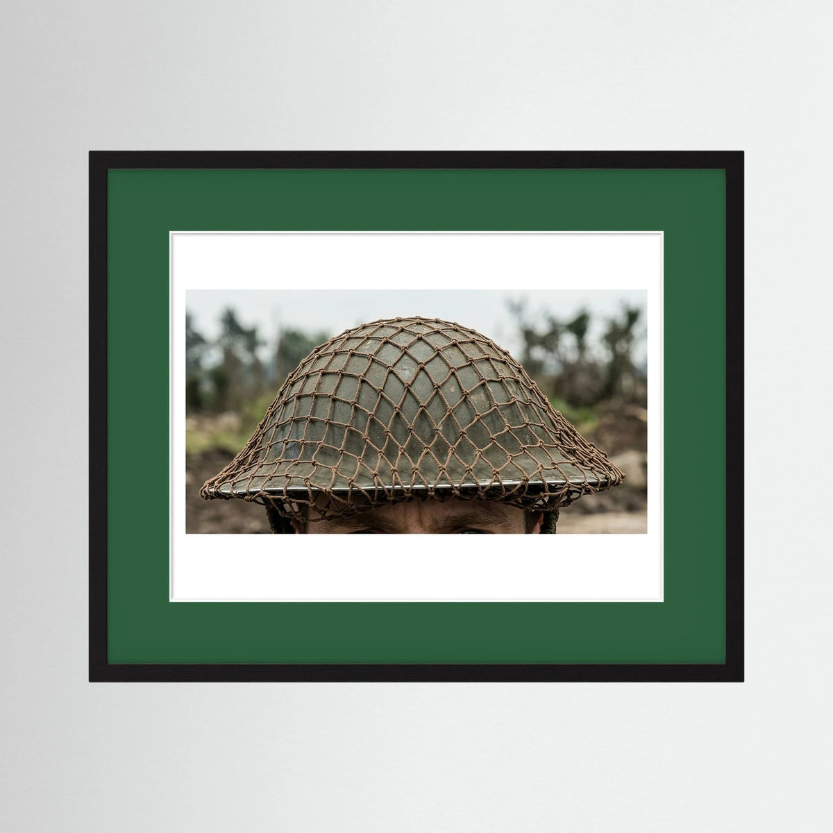 Mk II Brodie Helmet WW2 British Armed Forces. All ranks — photograph displayed in a black wood frame mockup