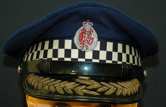 NEW ZEALAND Police Peaked Cap wBadge, manufactured in Wellington checkered Sillitoe Tartan band, gold-embroidered oak leaves on the visor and a senior officer cap badge - Art goes to War