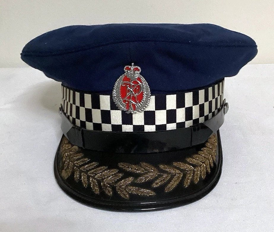 NEW ZEALAND Police Peaked Cap wBadge, Wellington checkered Sillitoe Tartan band, gold-embroidered oak leaves on the visor and a senior officer cap badge - Art goes to War