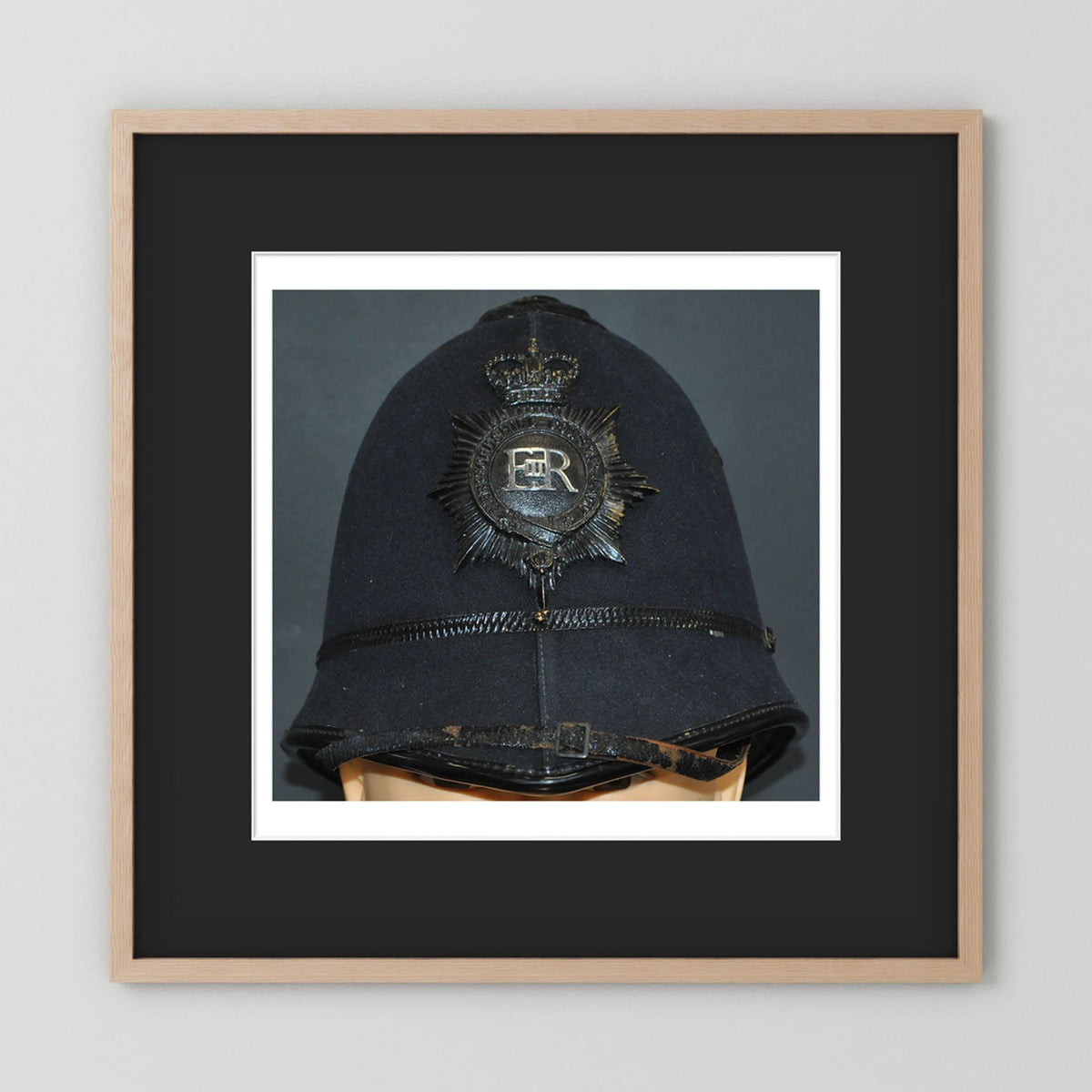 Police Helmet "Bobby." Hertfordshire Constabulary, United Kingdom. British — photograph presentation mockup