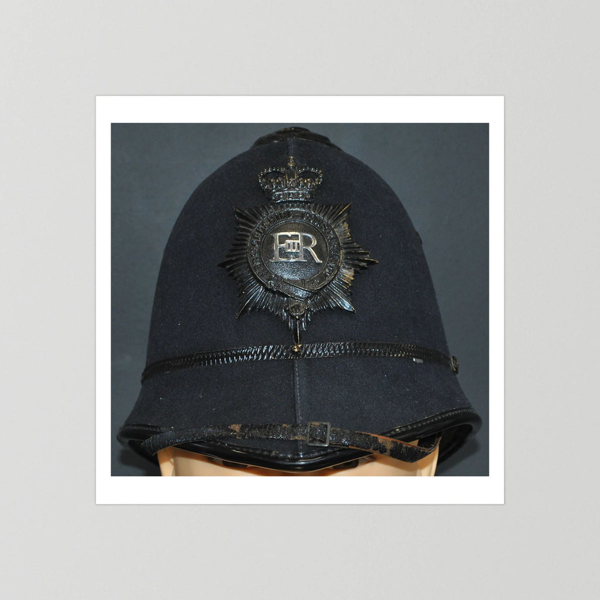 Police Helmet "Bobby." Hertfordshire Constabulary, United Kingdom. British — photograph presentation mockup