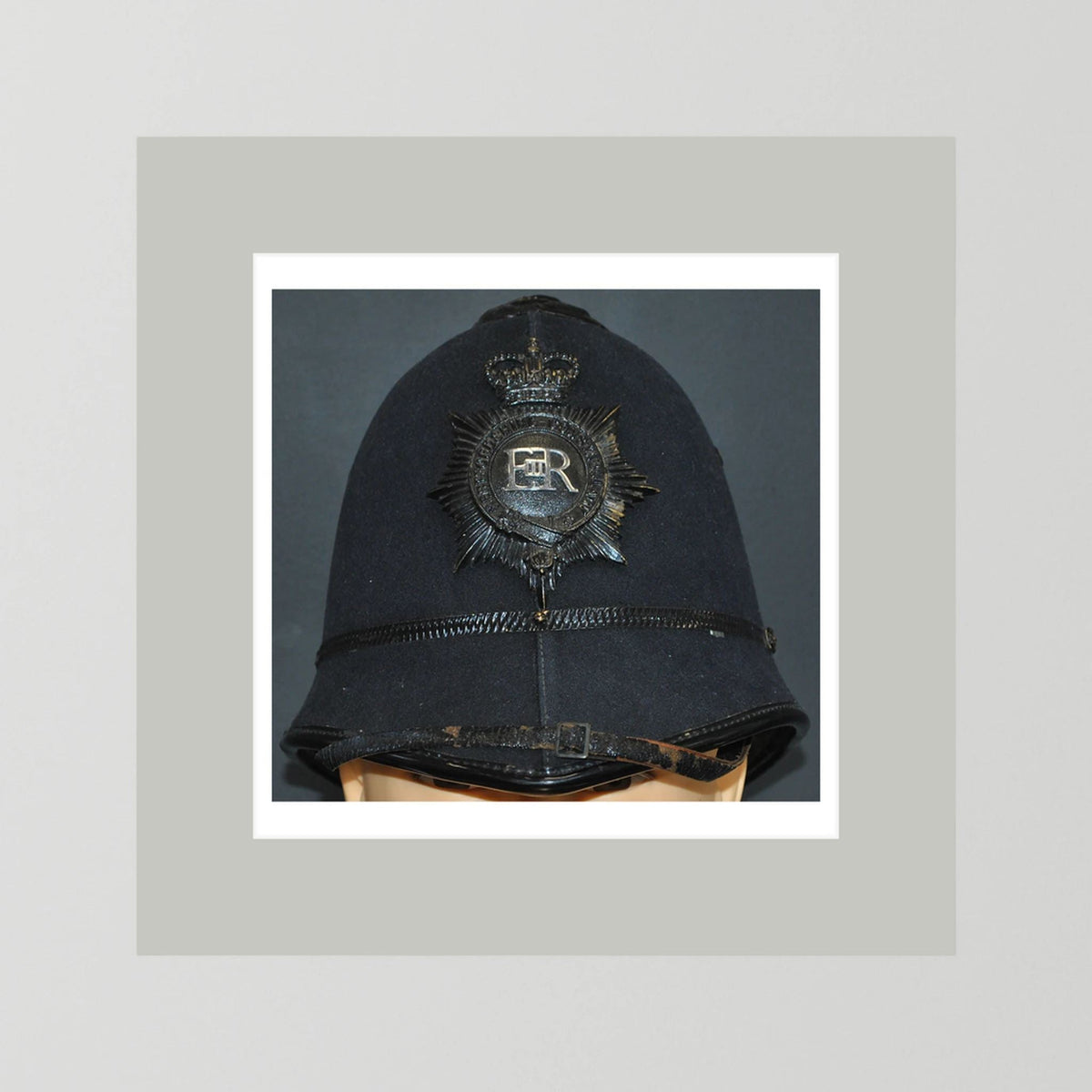 Police Helmet "Bobby." Hertfordshire Constabulary, United Kingdom. British — photograph presentation mockup