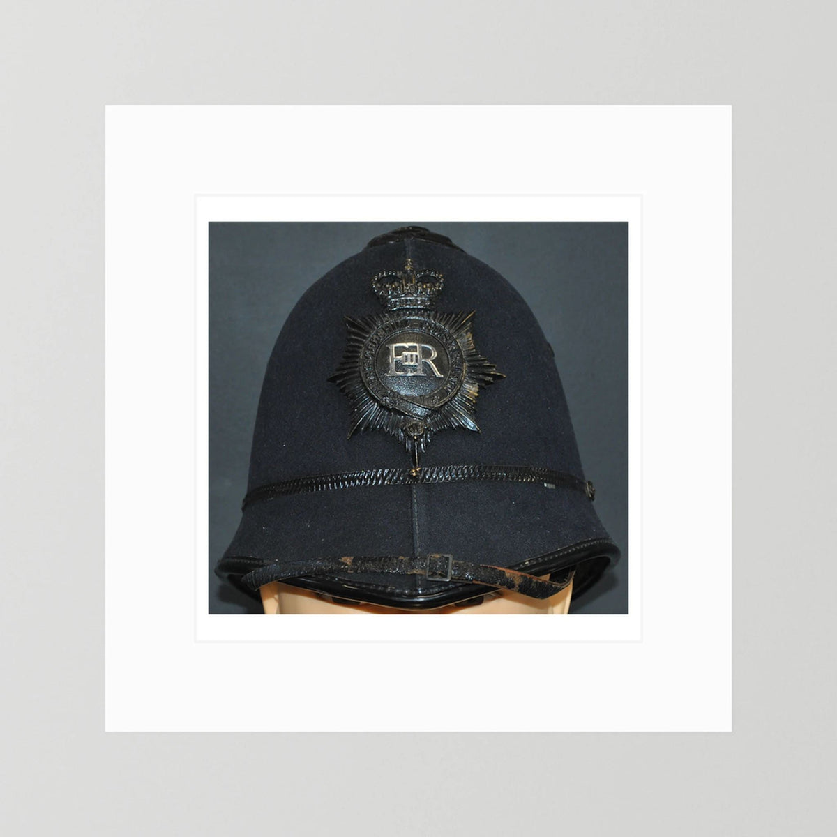 Police Helmet "Bobby." Hertfordshire Constabulary, United Kingdom. British — photograph presentation mockup