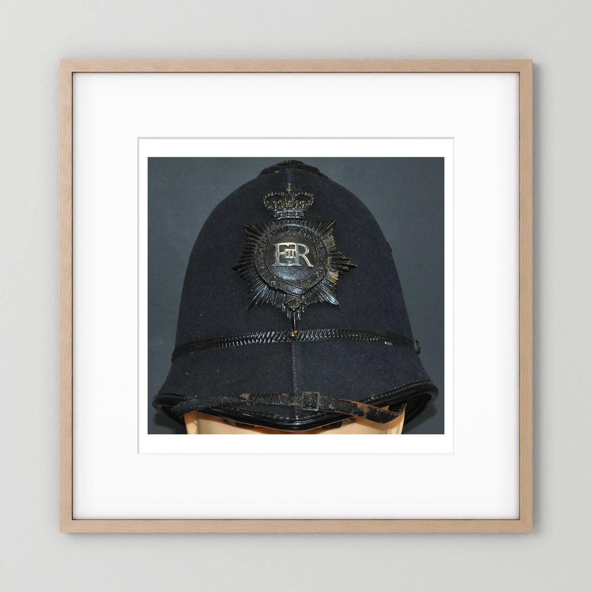 Police Helmet "Bobby." Hertfordshire Constabulary, United Kingdom. British — photograph presentation mockup